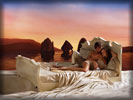 Olivia Wilde on the Bed in Lavazza Advert